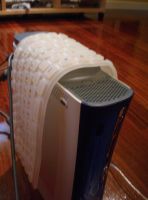 Disco externo de almacenamiento sobre el que hay un teclado flexible